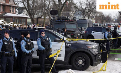 Minneapolis Police officers secure the area near the scene where a driver was shot by a U.S. immigration agent, according to local and federal officials, in Minneapolis, Minnesota, U.S.(REUTERS)