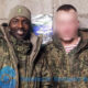 Adamu Abubakar in Russian Army’s uniform flanked by another soldier