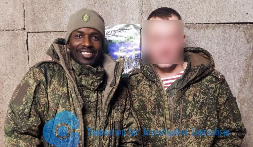 Adamu Abubakar in Russian Army’s uniform flanked by another soldier