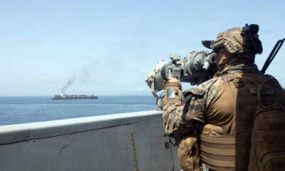 This US Navy handout photograph released on April 21, 2026, by US Central Command Public Affairs shows US forces patrolling the Arabian Sea near the Touska, an Iranian-flagged cargo ship, on April 20, 2026. © AFP photo / US Navy / US Central Command Public Affairs handout photo