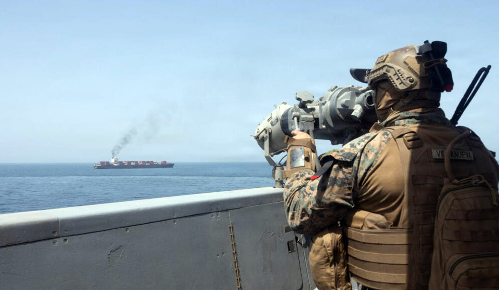 This US Navy handout photograph released on April 21, 2026, by US Central Command Public Affairs shows US forces patrolling the Arabian Sea near the Touska, an Iranian-flagged cargo ship, on April 20, 2026. © AFP photo / US Navy / US Central Command Public Affairs handout photo