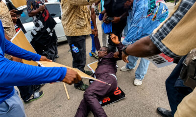 Omoyele Sowore Collapses as Tear Gas Disrupts Democracy Day Protest in Abuja.psd